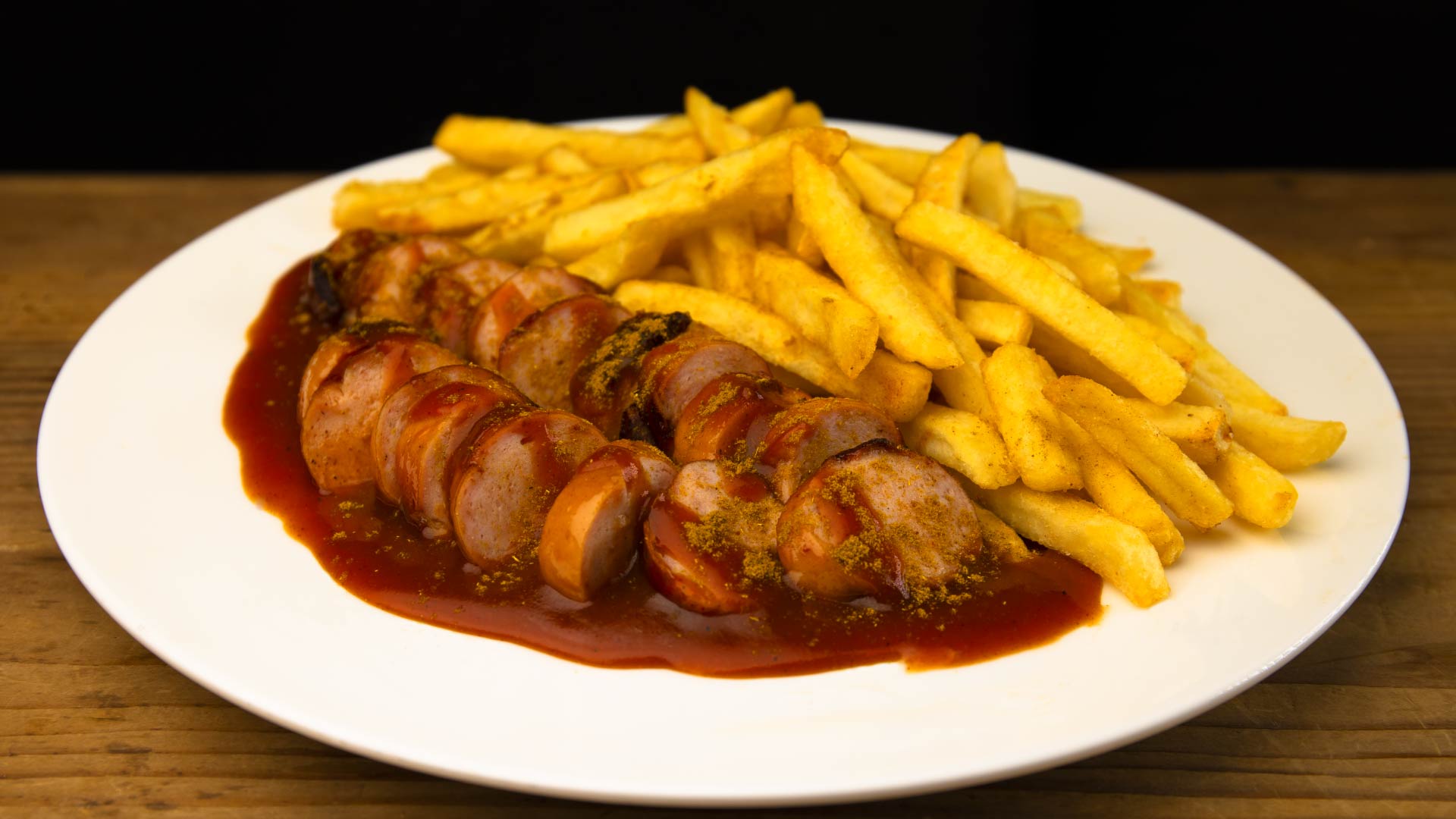 11 - Currywurst mit Pommes